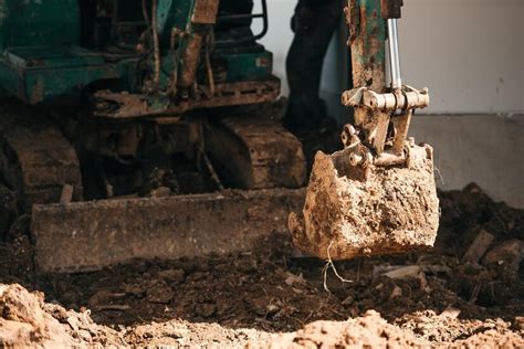 excavator digging|digging footings with mini excavator.